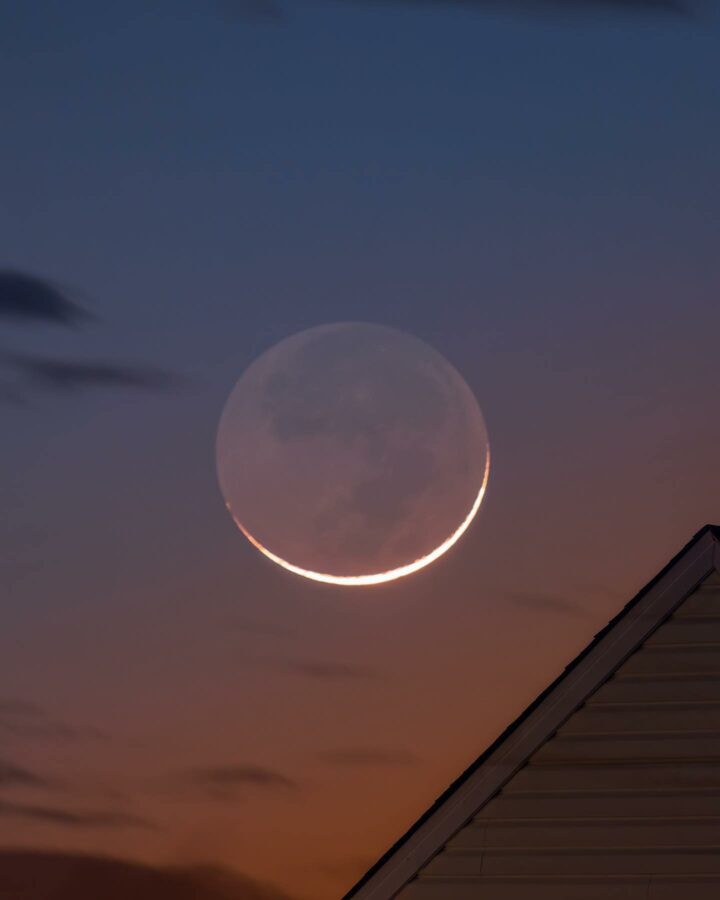 Crescent moon of Ramadan 1444 AH with "earth shine" captured in this photo from Glen Allen, VA, USA (Romi Astro).