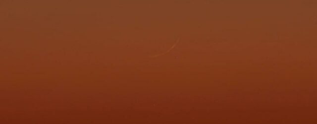 Crescent moon photo of 1 Muharram 1445 AH from Jordan on Tuesday evening seen through binoculars.