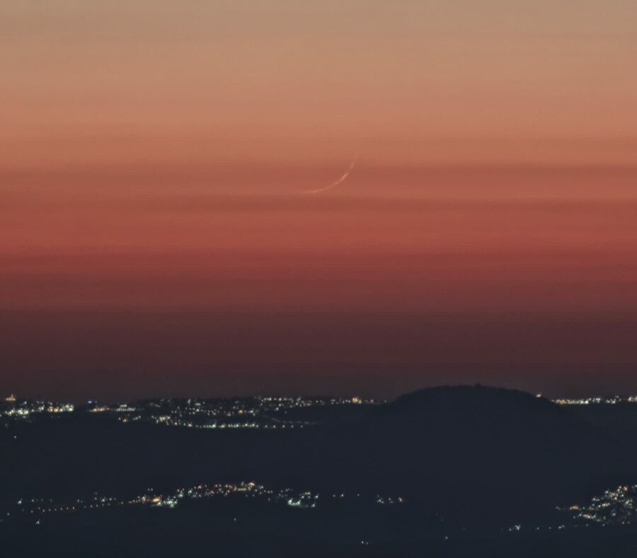 Crescent moon photo of 1 Muharram 1445 AH from Jordan on Tuesday evening seen through binoculars.